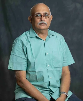 Dr. Mahesh G